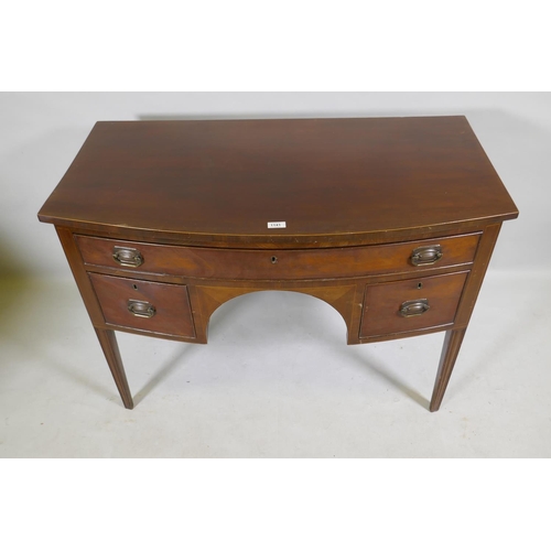 1141 - C19th mahogany three drawer bow fronted kneehole dressing table/desk, with original plate handles, r... 