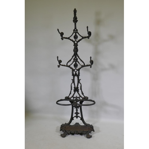 1142 - A painted cast iron stick and hat stand, 137cm high