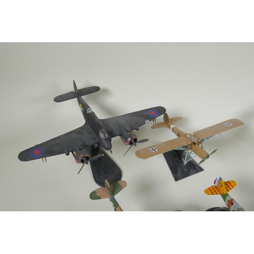 115 - Thirteen assorted 1:72 scale model aircraft including Corgi, Hobby Master, Falcon Models etc, four w... 