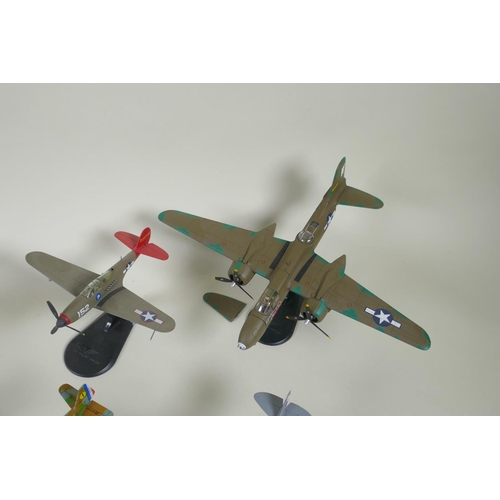 115 - Thirteen assorted 1:72 scale model aircraft including Corgi, Hobby Master, Falcon Models etc, four w... 