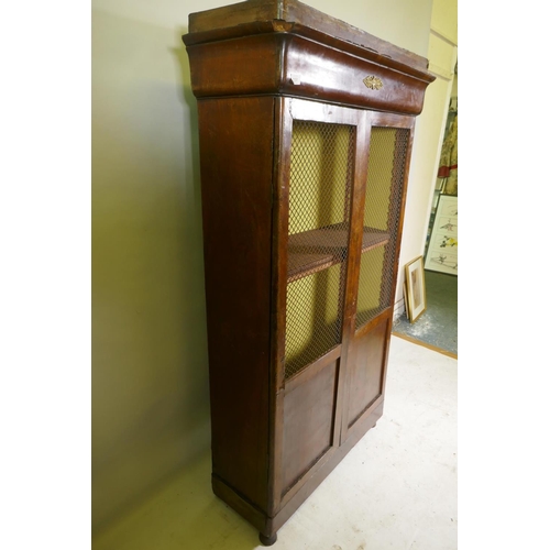 1151 - A C19th French mahogany two door cupboard with wire grilled doors, 97 x 35 x 166cm