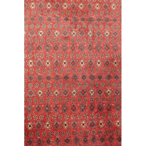 1159 - A large Belgian red ground wool rug with Persian design, 294 x 366cm