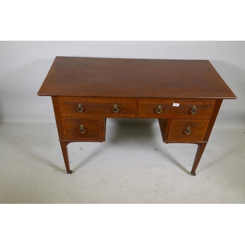 1163 - A Victorian mahogany kneehole desk with satinwood banding inlay and brass handles, four drawers rais... 