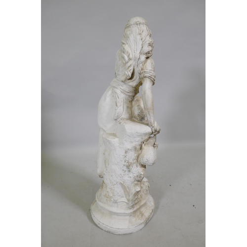 1165 - A painted reconstituted garden statue of a female water carrier, 67cm high