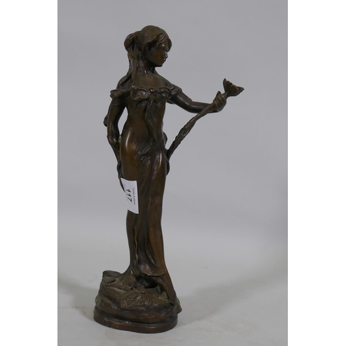 117 - Bronze figure of a girl with a flower, impressed Lola, 32cm high