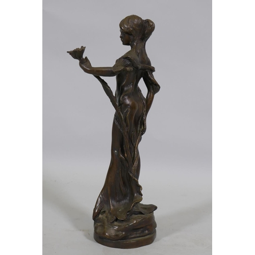 117 - Bronze figure of a girl with a flower, impressed Lola, 32cm high