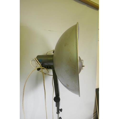 1172 - A pair of industrial RRB floor standing studio lamps, and a similar Malham lighting equipment SE23 s... 