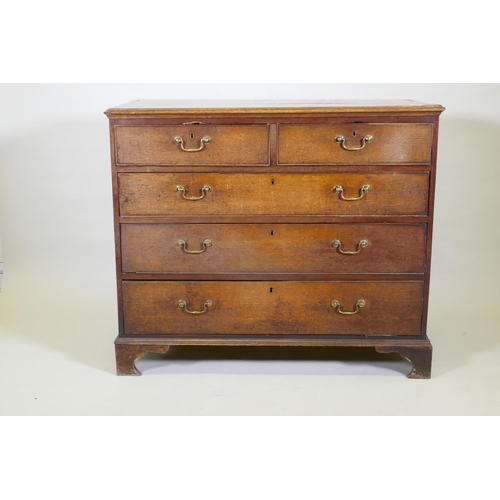 1199 - A Georgian oak chest of two over three drawers, mahogany banded top, cockbeaded drawers with origina... 