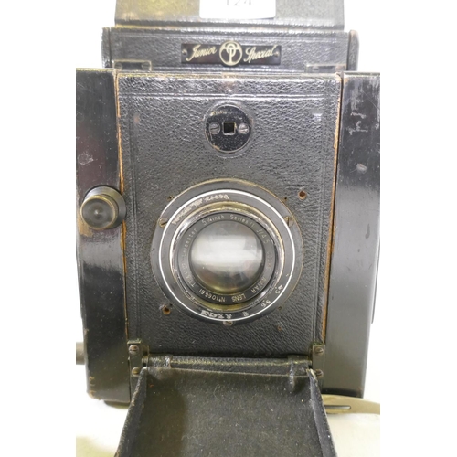 124 - A Thornton Pickard Junior Special camera and plate holders, with a Cooke Aviar lens No 106661