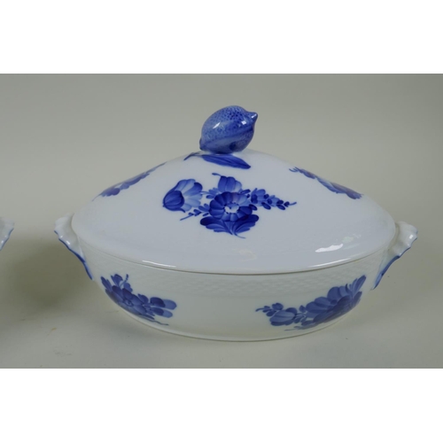 132 - A pair of Royal Copenhagen blue and white porcelain tureens with floral decoration and lemon knops, ... 