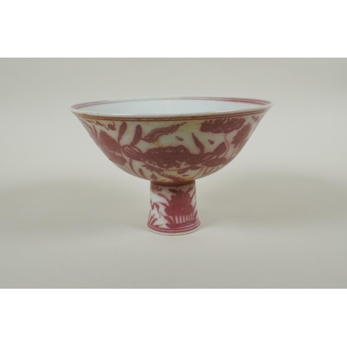 138 - A Chinese red and white porcelain stem bowl decorated with carp in a lotus pond, Xuande 6 character ... 