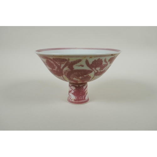 138 - A Chinese red and white porcelain stem bowl decorated with carp in a lotus pond, Xuande 6 character ... 