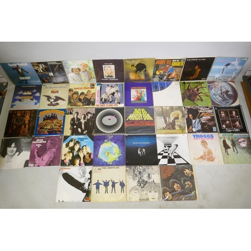 141 - A quantity of vintage rock and pop 12