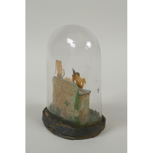 149 - A Victorian wax nativity scene in a hand blown glass dome, 14cm high