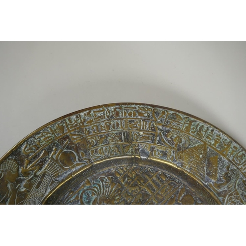 154 - An antique heavy Egyptian  bronze tray decorated with depictions of pharaoh and hieroglyphics, ... 