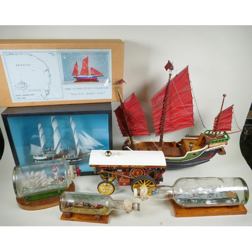 158 - A kit built model of the whaler Charles W. Morgan in a glass display case, a 1:48 scale model kit of... 