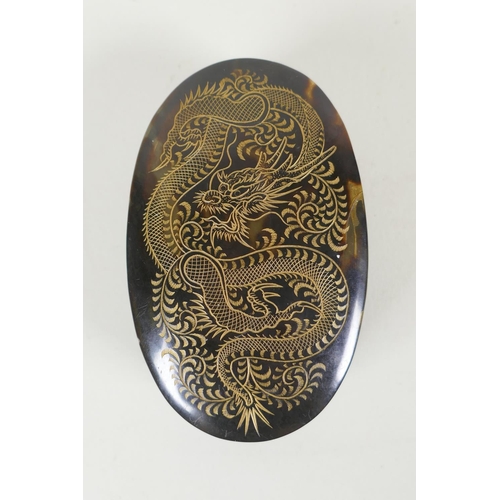 159 - An antique Chinese horn and tortoiseshell trinket box, the cover with engraved and gilt dragon decor... 