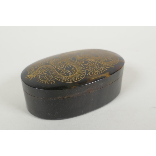 159 - An antique Chinese horn and tortoiseshell trinket box, the cover with engraved and gilt dragon decor... 