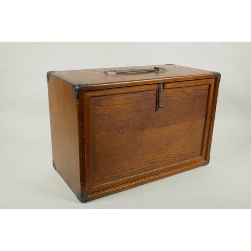 16 - A vintage engineer's metal mounted tool chest with contents, 43 x 22cm, 29cm high