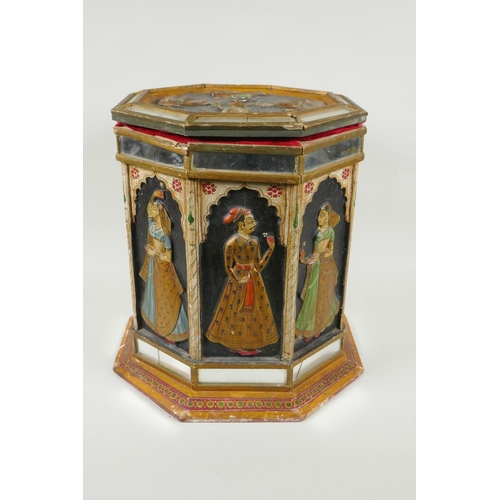 164 - An Indian hand painted carved wood hexagonal turban box set with mirror tiles, each panel decorated ... 