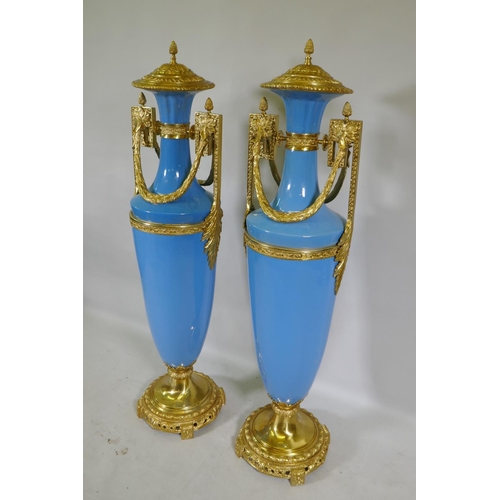 167 - A large pair of Sevres blue style ceramic urns with ormolu mounts, 135cm high