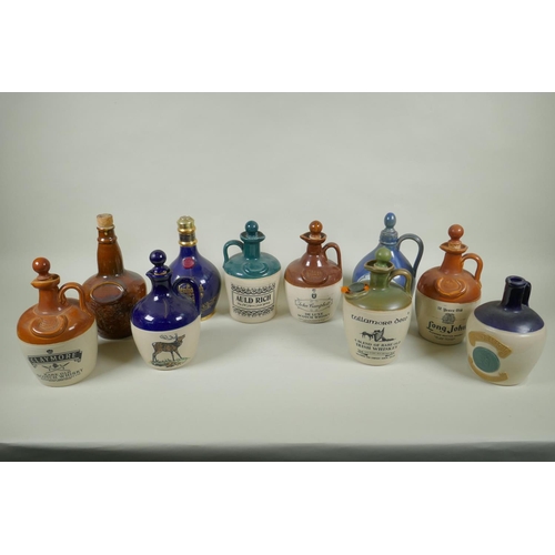 170 - Ten stoneware Whisky flagons, Claymore, Tullamore Dew, Long John, Glenfiddich, John Campbell etc