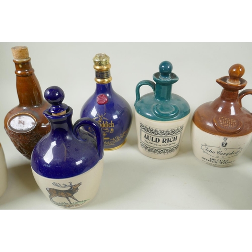 170 - Ten stoneware Whisky flagons, Claymore, Tullamore Dew, Long John, Glenfiddich, John Campbell etc