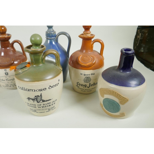 170 - Ten stoneware Whisky flagons, Claymore, Tullamore Dew, Long John, Glenfiddich, John Campbell etc