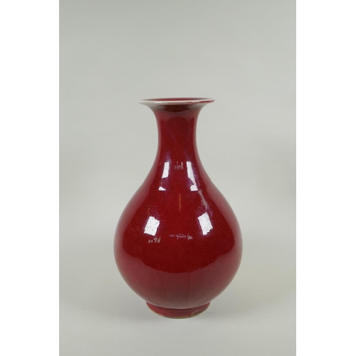 175 - A Chinese flambe glazed porcelain pear shaped vase, YongZheng 4 character mark to base, 33cm high