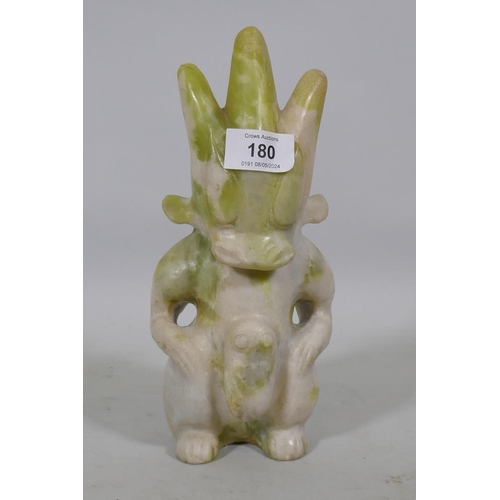 180 - An Eastern marble carving of a demon, 25cm high