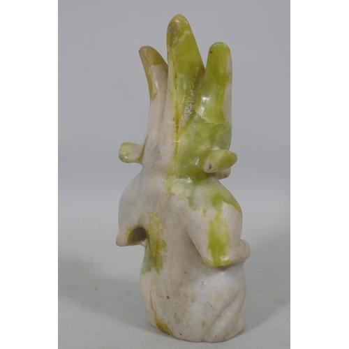 180 - An Eastern marble carving of a demon, 25cm high