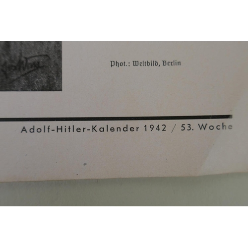 194 - A Third Reich 1942 Adolf Hitler 52 week wall calendar, each page with photographs of the leader, lac... 