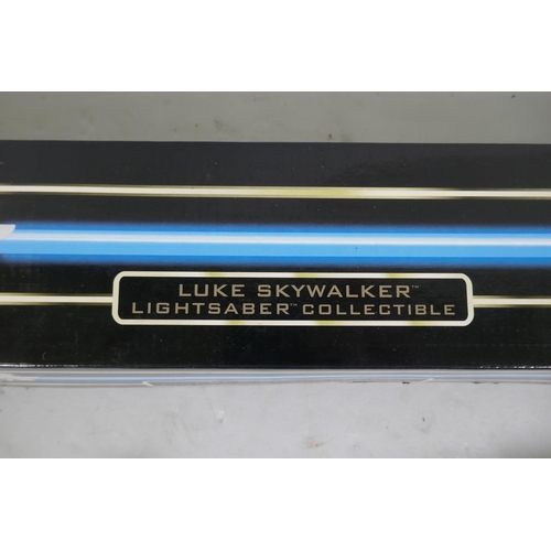 196 - A Star Wars Master Replicas 'Force FX' Luke Skywalker Lightsaber collection, in original box with di... 