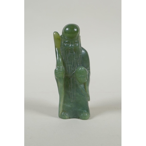 198 - A Chinese carved green jade Shou Lao figure, 11cm high