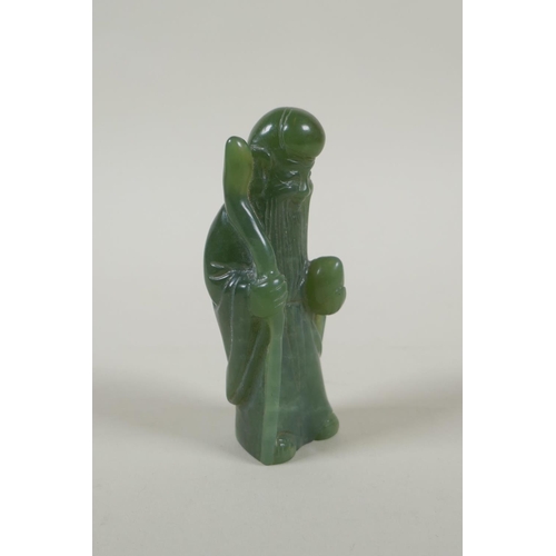 198 - A Chinese carved green jade Shou Lao figure, 11cm high