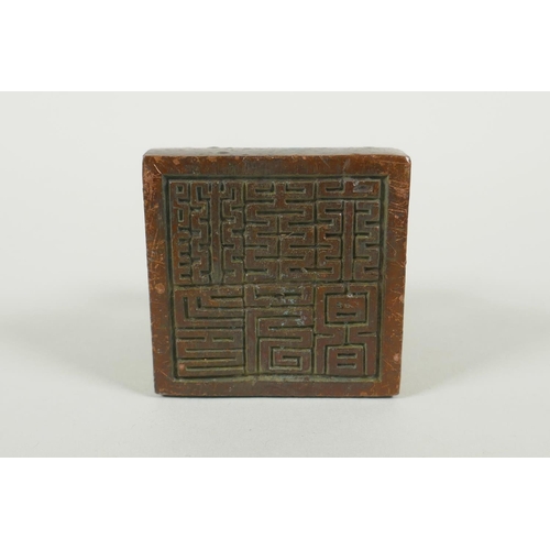 199 - A Chinese bronze seal decorated with a Buddhist symbol, 5.5 x 5.5cm