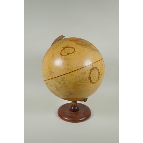 202 - A Replogle 12 inch diameter globe, 'World Classic Series' on a wood stand