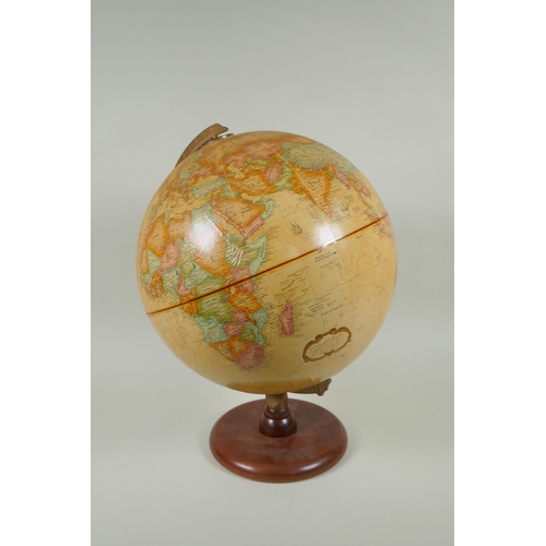 202 - A Replogle 12 inch diameter globe, 'World Classic Series' on a wood stand