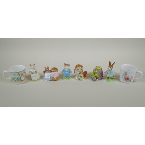 206 - A collection of Beatrix Potter related porcelain, to include six Beswick figurines, Peter Rabbit, Ta... 