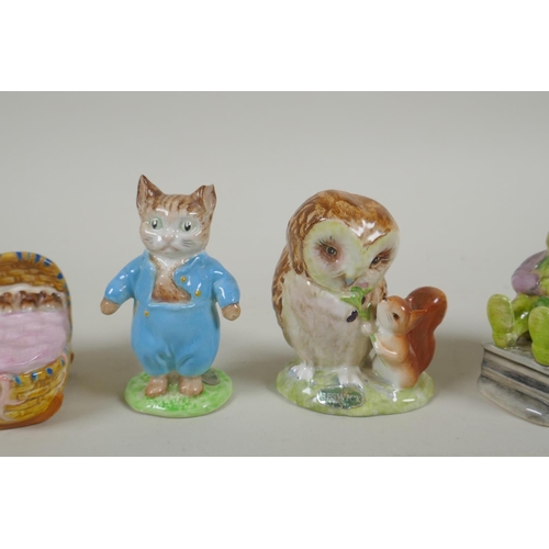 206 - A collection of Beatrix Potter related porcelain, to include six Beswick figurines, Peter Rabbit, Ta... 