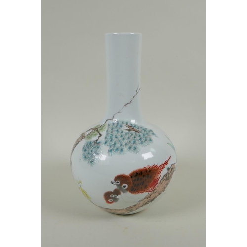 211 - A Chinese polychrome porcelain bottle vase decorated with birds perched on a branch, character inscr... 