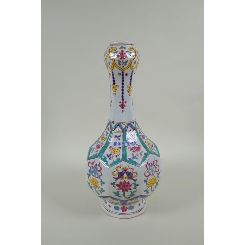 213 - A Chinese polychrome porcelain garlic head vase, with enamel decoration of the eight Buddhist treasu... 