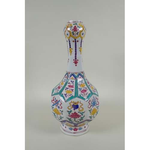 213 - A Chinese polychrome porcelain garlic head vase, with enamel decoration of the eight Buddhist treasu... 