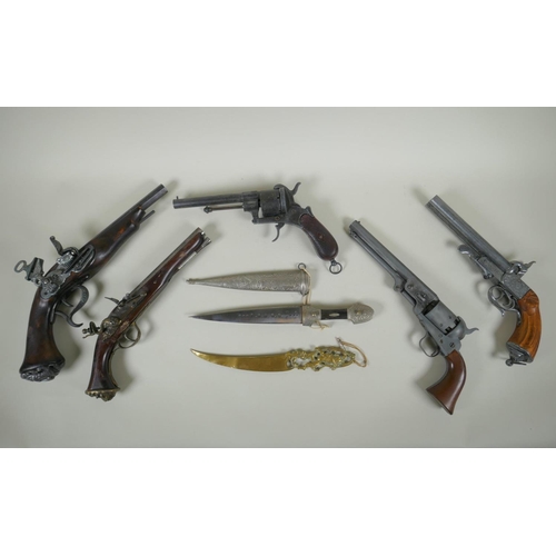 216 - Five replica pistols, including a French Lefaucheux pinfire revolver and a Colt model 1851, and two ... 