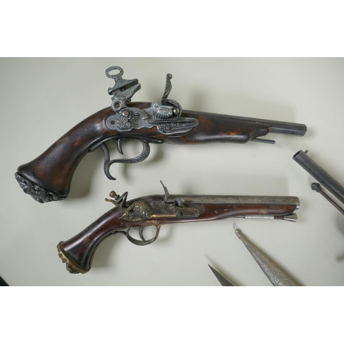 216 - Five replica pistols, including a French Lefaucheux pinfire revolver and a Colt model 1851, and two ... 