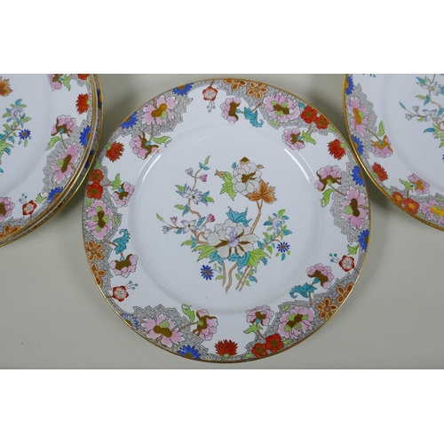 217 - A set of twelve Copeland Spode plates with polychrome and gilt floral design, 26cm diameter