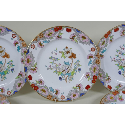 217 - A set of twelve Copeland Spode plates with polychrome and gilt floral design, 26cm diameter