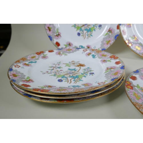 217 - A set of twelve Copeland Spode plates with polychrome and gilt floral design, 26cm diameter