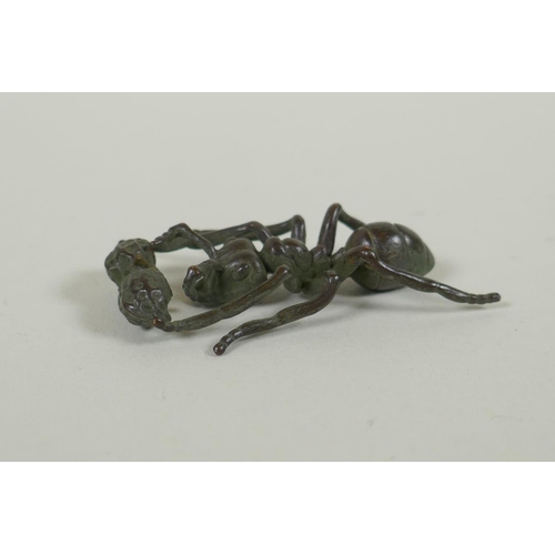 220 - A Japanese style bronze incense holder in the form of an ant, 5cm long