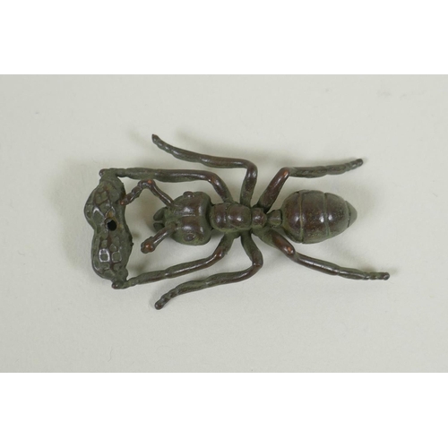 220 - A Japanese style bronze incense holder in the form of an ant, 5cm long